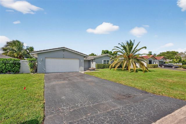 8588 NW 27th Dr, Coral Springs, FL 33065