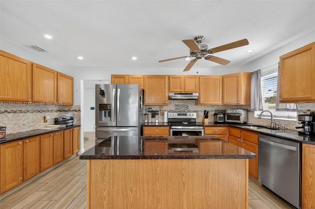 8588 NW 27th Dr, Coral Springs, FL 33065