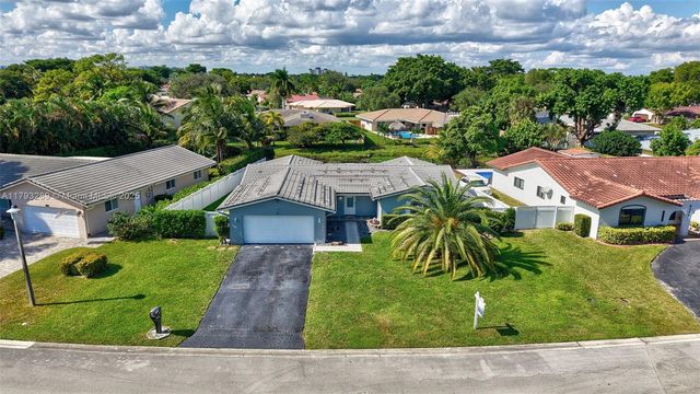 8588 NW 27th Dr, Coral Springs, FL 33065