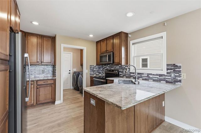 1171 Creekside Court, Burton, MI 48509
