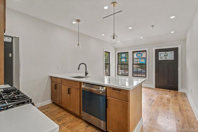 6037 Wetherole Street, Rego Park, NY 11373