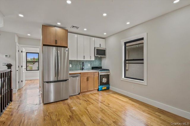 6037 Wetherole Street, Rego Park, NY 11373