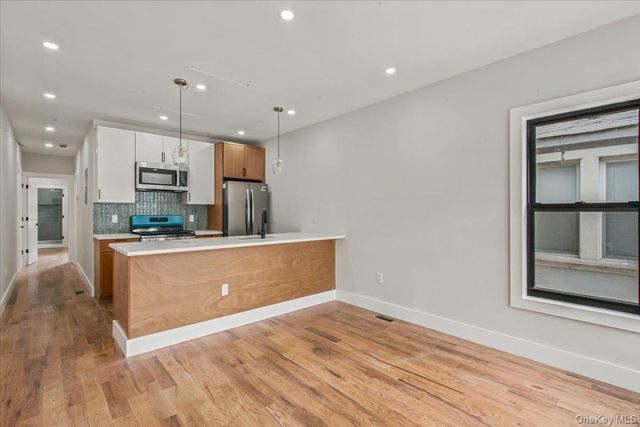 6037 Wetherole Street, Rego Park, NY 11373