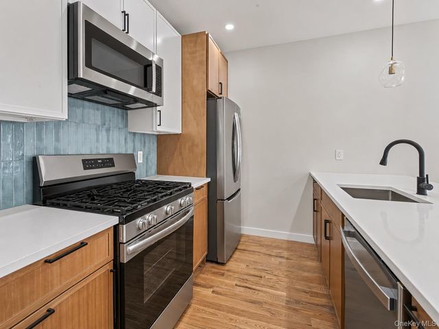 6037 Wetherole Street, Rego Park, NY 11373