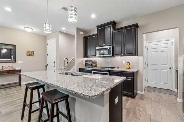 18907 CORNUTA STREET, Lutz, FL 33558