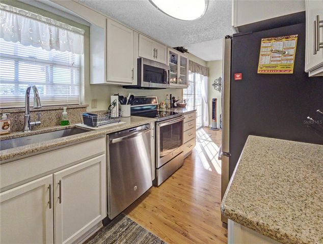 7991 MIDWAY DRIVE TERRACE L201, Ocala, FL 34472
