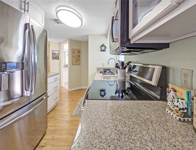 7991 MIDWAY DRIVE TERRACE L201, Ocala, FL 34472