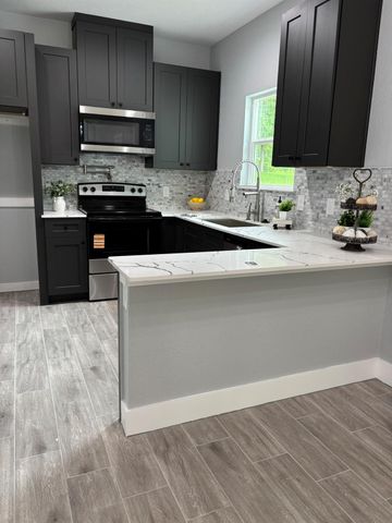 15123 Arrowhead Loop E, Willis, TX 77378