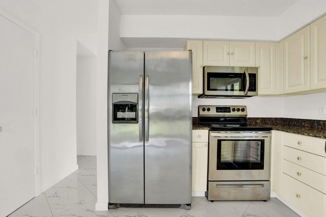 3705 SW Quail Meadow Trail E, Palm City, FL 34990