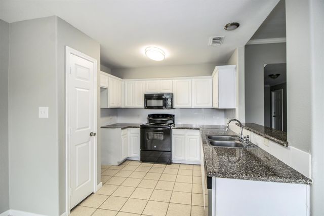 406 Woodlake Drive, Houston, TX 77336