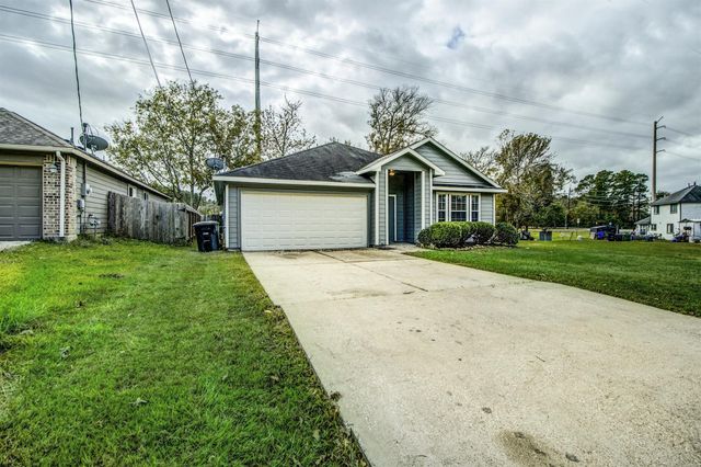 406 Woodlake Drive, Houston, TX 77336