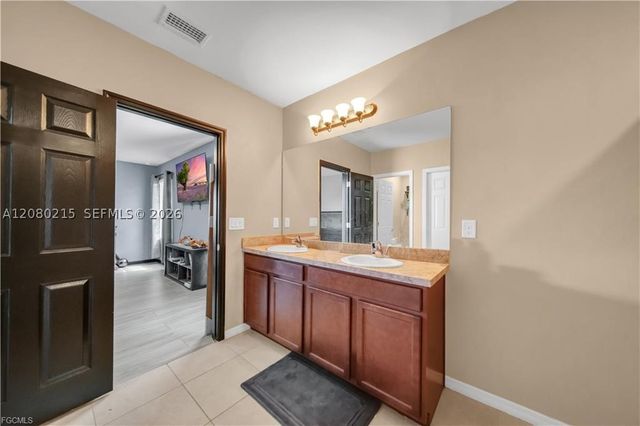 10549 Canal Brook LN, Lehigh Acres, FL 33936