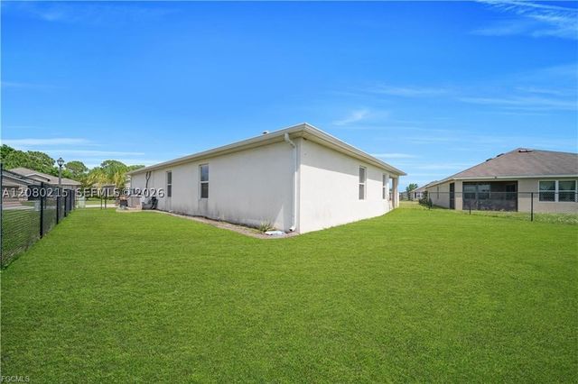 10549 Canal Brook LN, Lehigh Acres, FL 33936