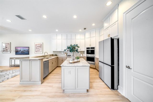 8766 Miralago Way, Parkland, FL 33076