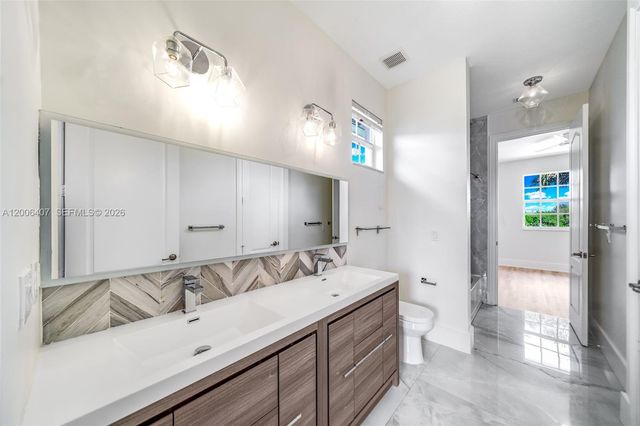 8766 Miralago Way, Parkland, FL 33076