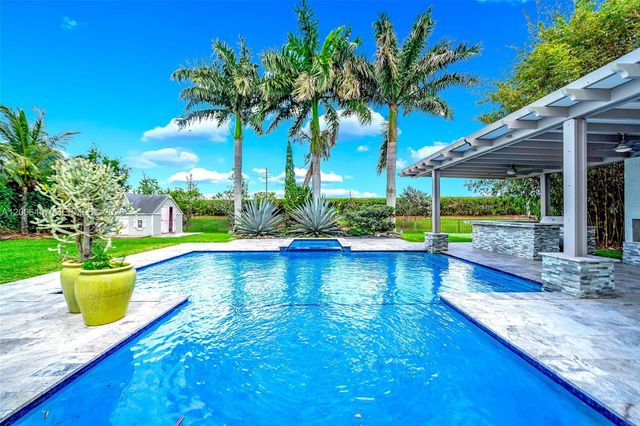 8766 Miralago Way, Parkland, FL 33076