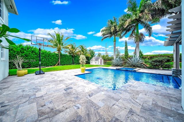 8766 Miralago Way, Parkland, FL 33076
