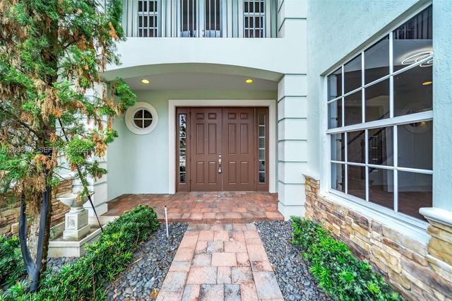 8766 Miralago Way, Parkland, FL 33076