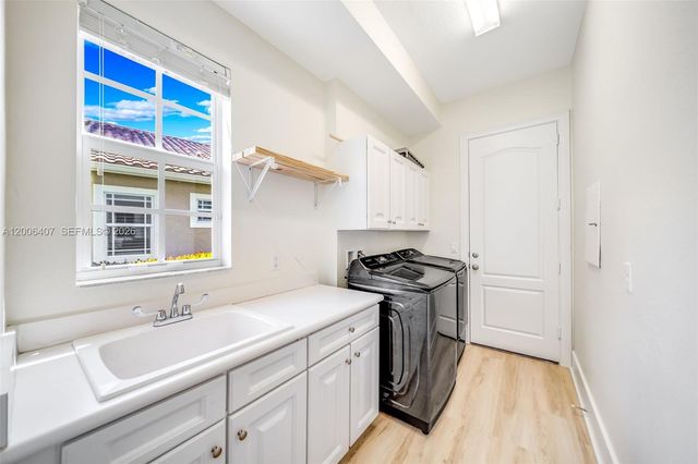 8766 Miralago Way, Parkland, FL 33076