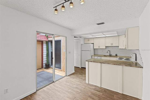 1163 ORANGE TREE CIRCLE W D, Palm Harbor, FL 34684