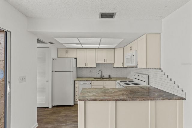 1163 ORANGE TREE CIRCLE W D, Palm Harbor, FL 34684