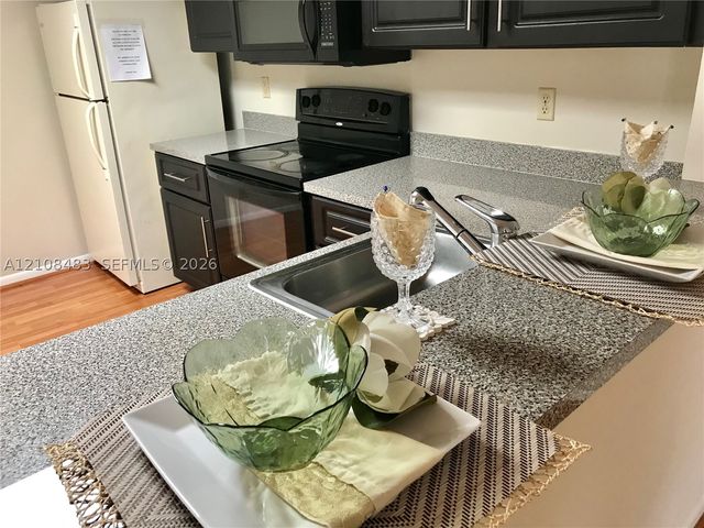 10121 W Sunrise Blvd 204, Plantation, FL 33322