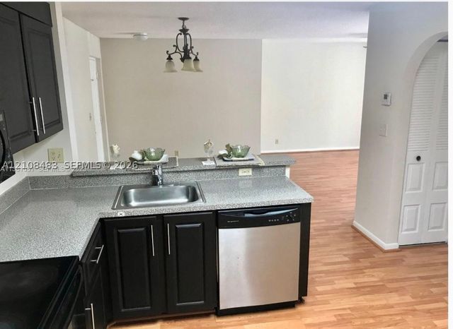 10121 W Sunrise Blvd 204, Plantation, FL 33322
