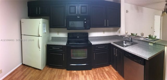 10121 W Sunrise Blvd 204, Plantation, FL 33322