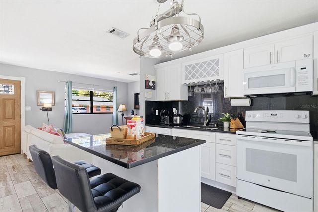 10405 N WOODMERE ROAD, Tampa, FL 33617