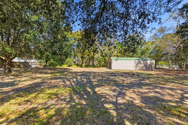 10405 N WOODMERE ROAD, Tampa, FL 33617