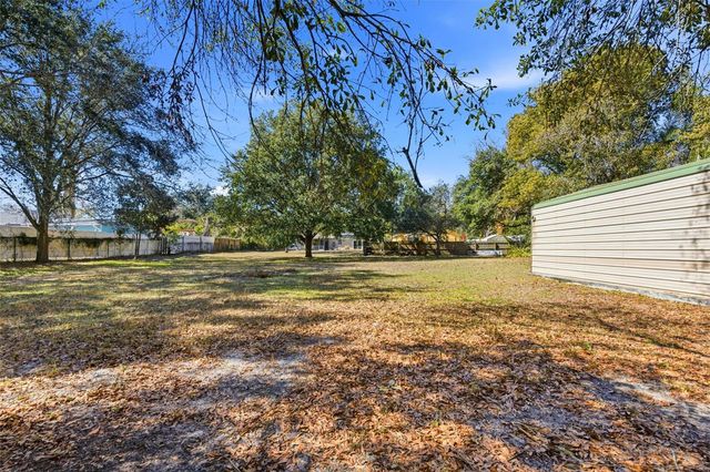 10405 N WOODMERE ROAD, Tampa, FL 33617
