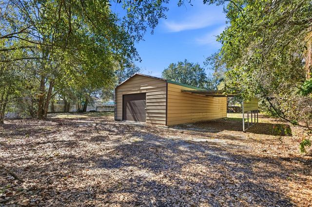 10405 N WOODMERE ROAD, Tampa, FL 33617