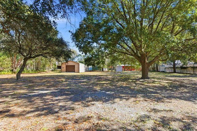 10405 N WOODMERE ROAD, Tampa, FL 33617