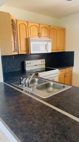5111 W Oakland Park Boulevard 306, Lauderdale Lakes, FL 33313