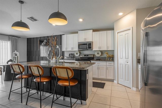 15415 MILLER CREEK DRIVE, Sun City Center, FL 33573