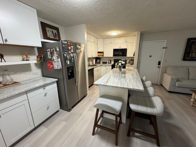 10425 E Clairmont Cir 107, Tamarac, FL 33321