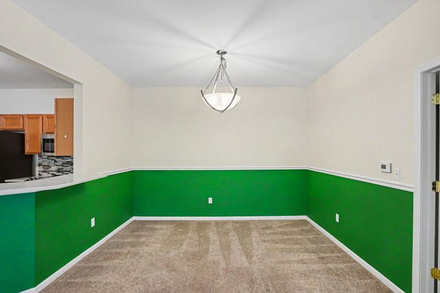 11107 Farmingdale Lane 130, Commerce Twp, MI 48390