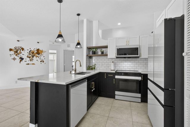 102 E Royal Pine Cir Court, Royal Palm Beach, FL 33411