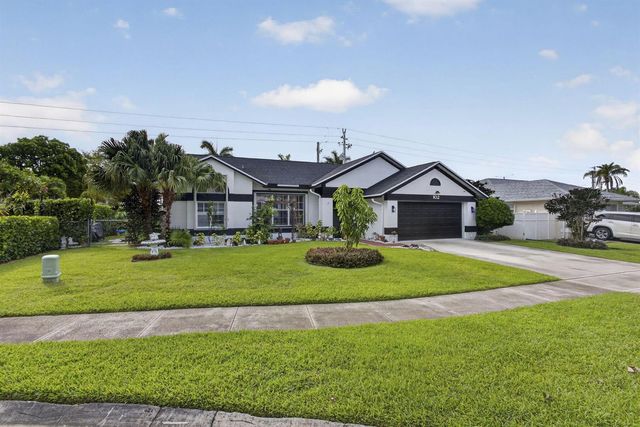102 E Royal Pine Cir Court, Royal Palm Beach, FL 33411