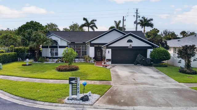 102 E Royal Pine Cir Court, Royal Palm Beach, FL 33411