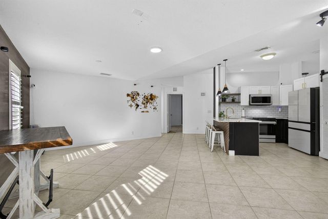 102 E Royal Pine Cir Court, Royal Palm Beach, FL 33411