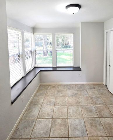 58 Breezy Point Place, The Woodlands, TX 77381