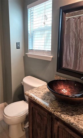 58 Breezy Point Place, The Woodlands, TX 77381