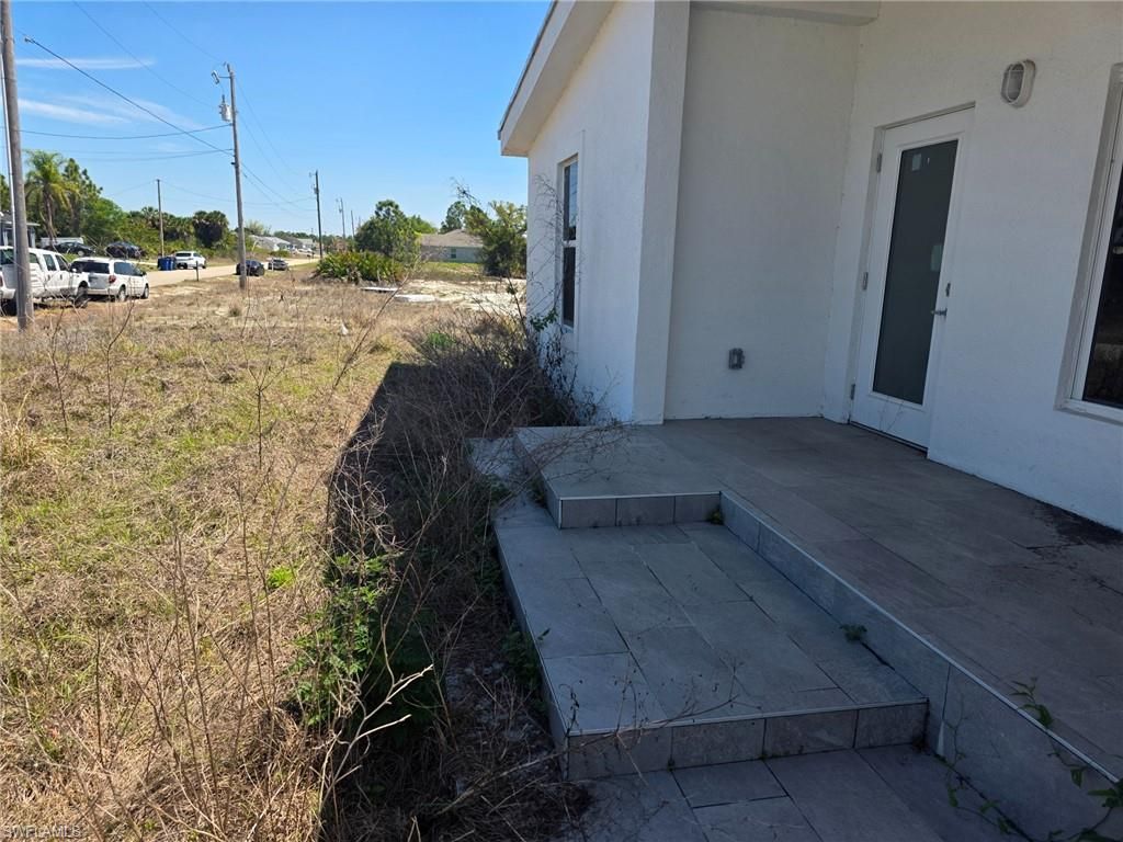 2913 34th ST SW, LEHIGH ACRES, FL 33976 — photo 2