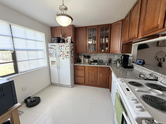 9908 HAMMOCKS Boulevard 103-42, Miami, FL 33196