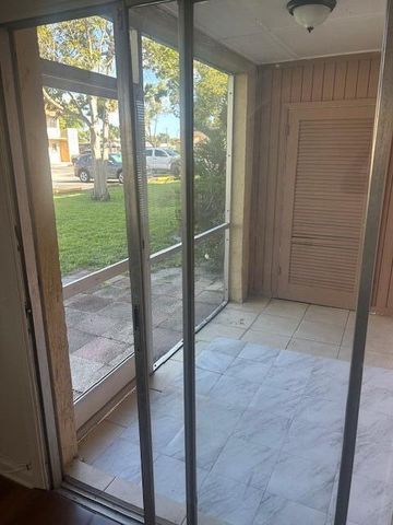 6054 Forest Hill Boulevard Apt 104, West Palm Beach, FL 33415