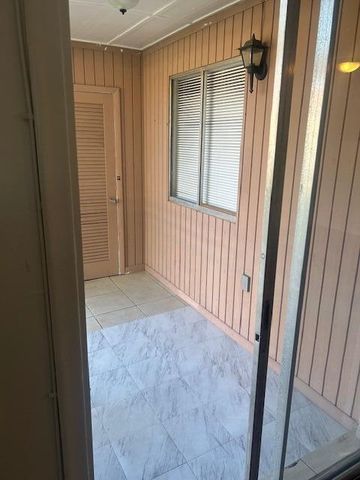 6054 Forest Hill Boulevard Apt 104, West Palm Beach, FL 33415