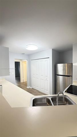3433 NW 44th Street 203, Oakland Park, FL 33309
