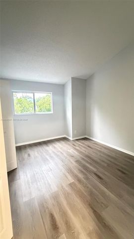 3433 NW 44th Street 203, Oakland Park, FL 33309