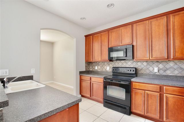 15830 WOODLAND SPRING COURT, Orlando, FL 32828